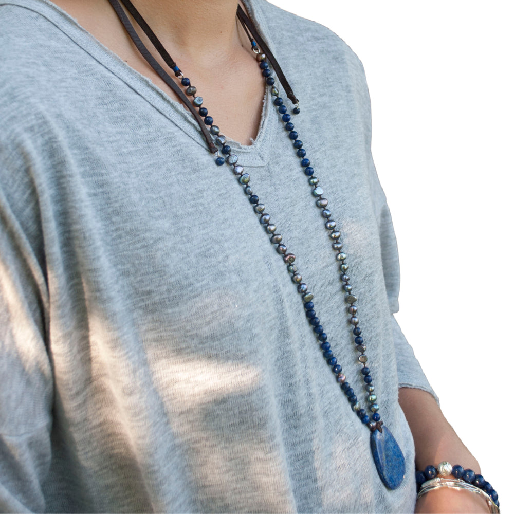 Long Necklace- artisan-crafted of lapis, grey freshwater pearls and genuine leather. Shown on a model. RockHill Exclusive