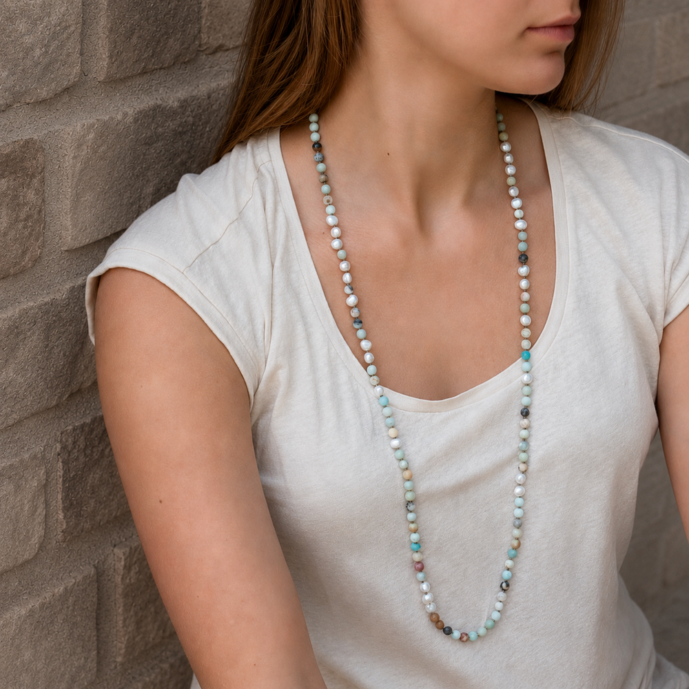 Peaceful Palette Necklace with amazonite and freshwater pearl beads worn as a long layered necklace.