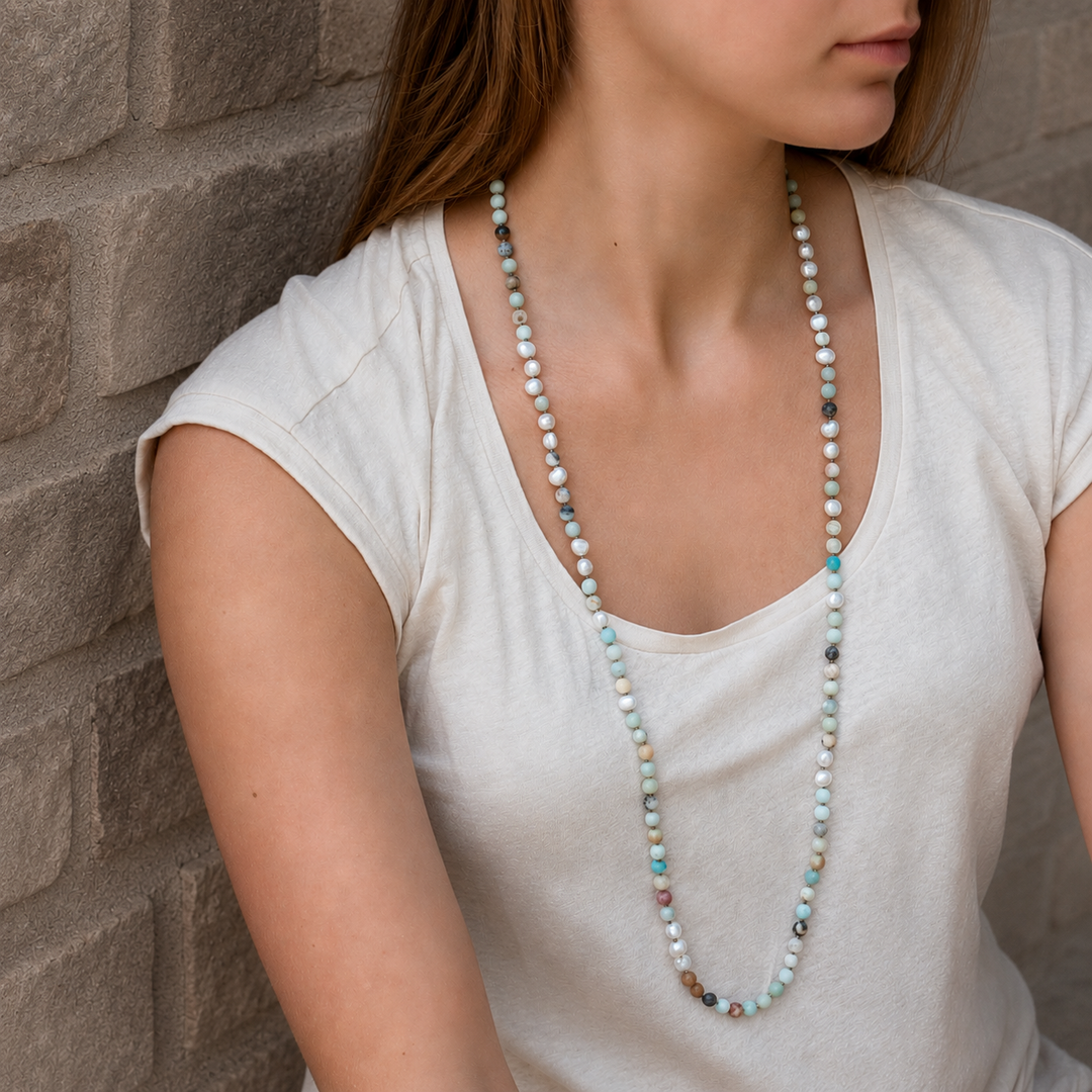 Peaceful Palette Necklace with amazonite and freshwater pearl beads worn as a long layered necklace.