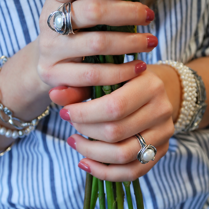 Model wearing the Cherished Pearl sterling silver ring to show scale and fit.
