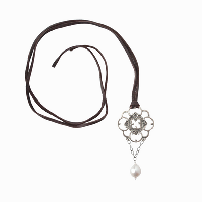 N2020 Lace on Leather shows silver lace pendant with a white freshwater pearl dangle. necklace is finished on chocolate brown leather lace.
