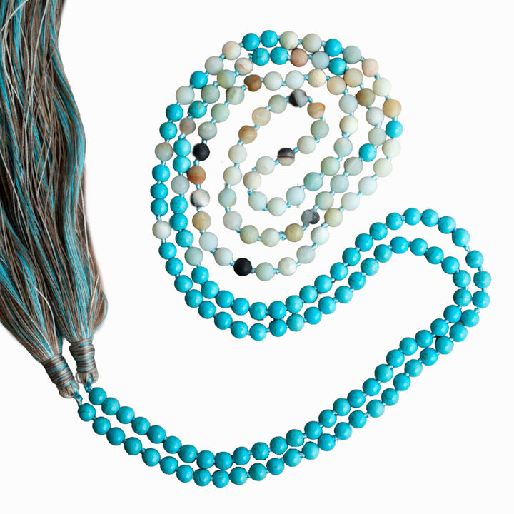 The necklace is shown wrapped in full on a white background. 