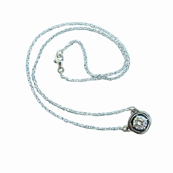 Silver Necklace with a centered clear CZ link. Artisan-crafted necklace is made of .925 stelring silver with clear cz. 