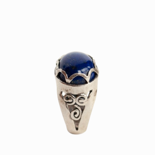 A blue lapis ring with intricate sterling silver band, featuring an 18mm by 14mm stone set in a sideways orientation.