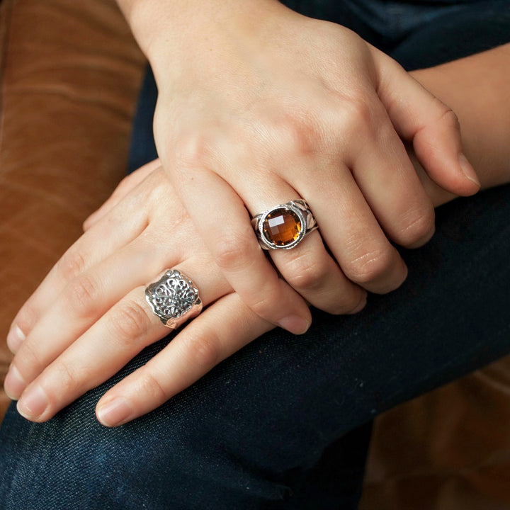 Silver Ring- Smoky quartz ring. Artisan-crafted ring made of .925 sterling silver and a light colored smoky quartz. Shown on a model.
