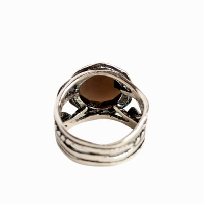 Silver Ring- Smoky quartz ring. Artisan-crafted ring made of .925 sterling silver and a light colored smoky quartz. Shown from the back.