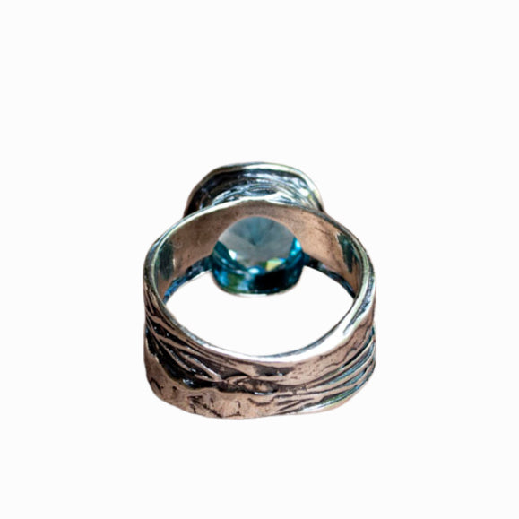 Silver Ring- artisan-crafted with .925 sterling silver and a blue topaz. Stunning Blue Ring. Back View Shown.