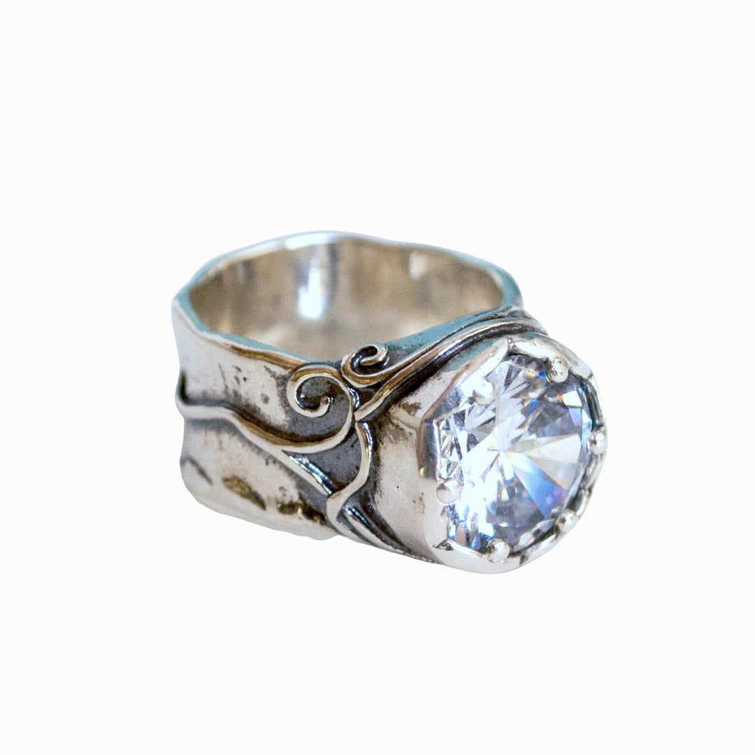 Silver Ring with large clear cz- artisan-crafted of .925 sterling silver is shown on a white background. 