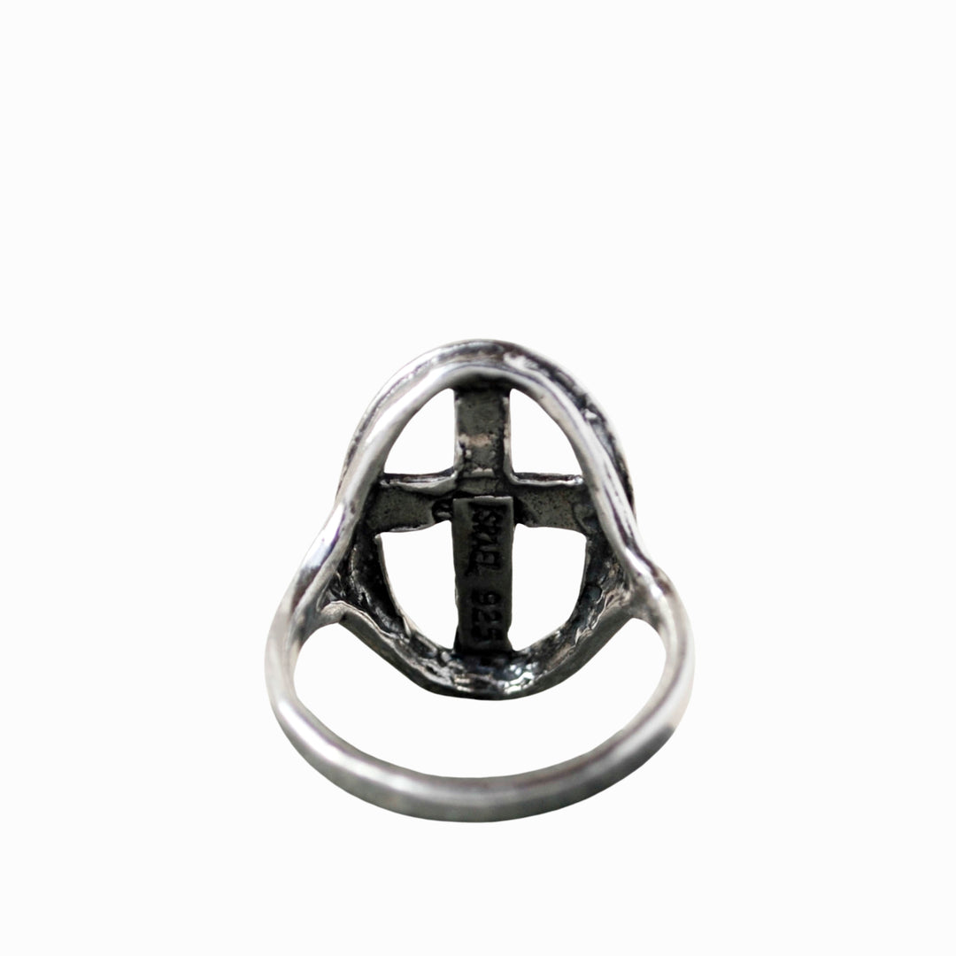 Cross Ring- crafted in .925 sterling silver, an open cross in an oval design. Shown by the back. 