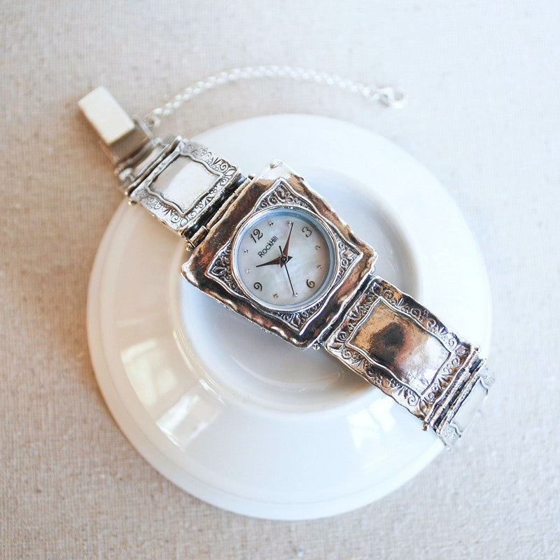 Watch. Sterling silver artisan-crafted watch with mother of pearl face..