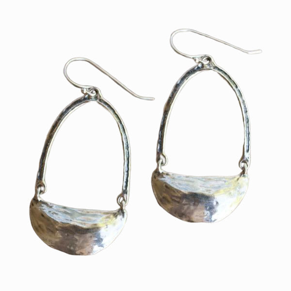 Artisan-crafted sterling silver earrings swing and sway. They measure 2 1/4" long and are shown on a white background